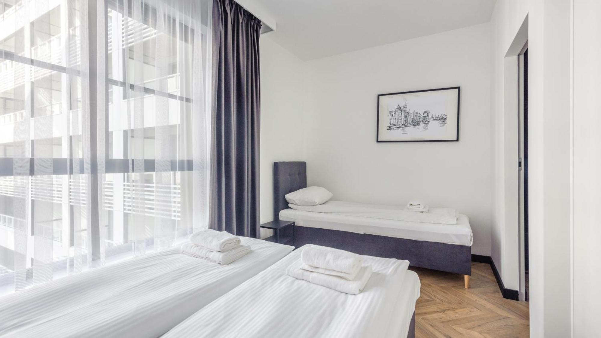 Flatbook - Center Doki Living Apartment